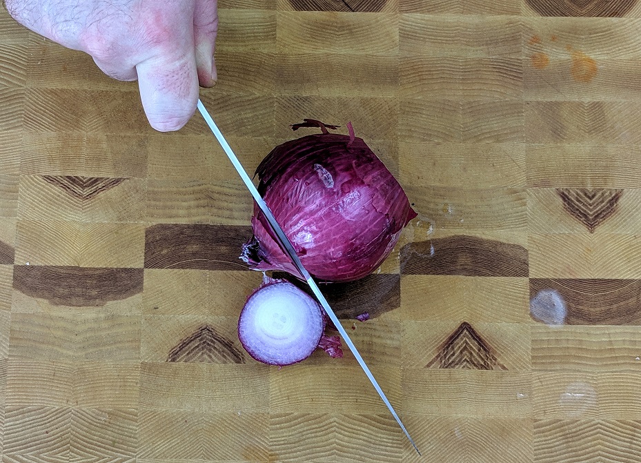 cutting the end off of the onion