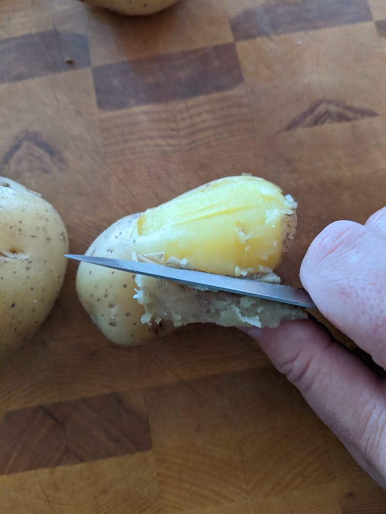 Peeling Potatoes For Gnocchi 
